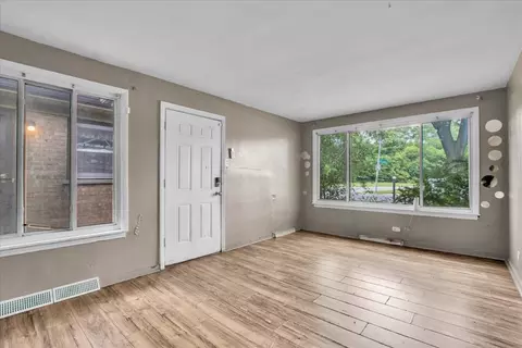 Living - 9302 S Rhodes Ave, Chicago, IL 60619 photo 1 of 5