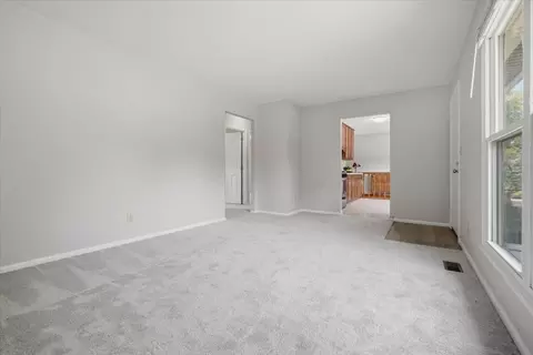 Living - 1302 Pinehurst Dr, Bloomington, IL 61704 photo 2 of 2