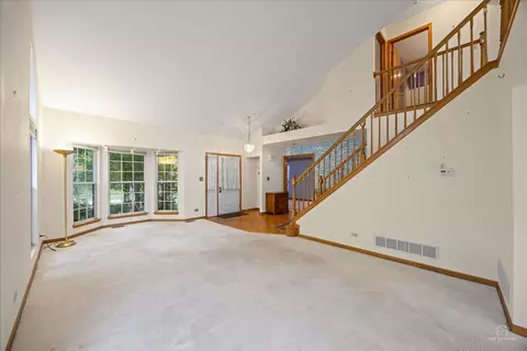 Living - 513 Eastwick Ln, Bartlett, IL 60103 photo 1 of 6