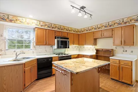 Kitchen - 513 Eastwick Ln, Bartlett, IL 60103 photo 2 of 3