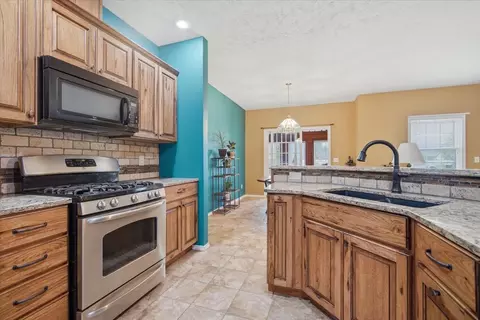 Kitchen - 604 Eddy Rd, Bloomington, IL 61704 photo 3 of 4