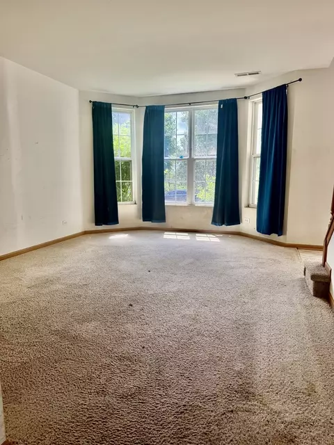 Living - 1110 Symphony Dr, Aurora, IL 60504 photo 1 of 5