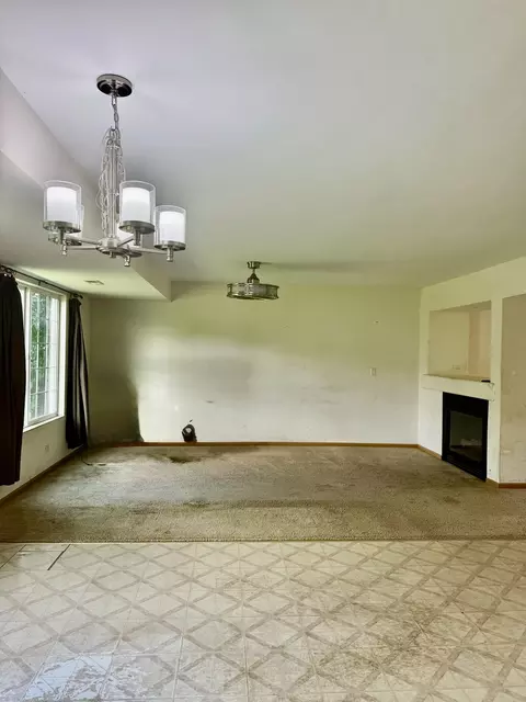 Living - 1110 Symphony Dr, Aurora, IL 60504 photo 4 of 5