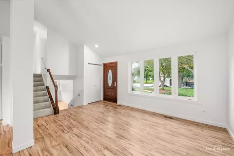 Living - 1702 Pebble Beach Dr, Plainfield, IL 60586 photo 2 of 7