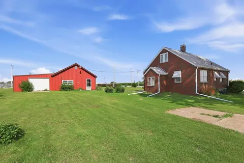 Exterior - 121 E Walcott Rd, Walcott, IA 52773 photo 3 of 4