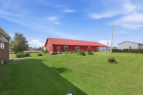 Exterior - 121 E Walcott Rd, Walcott, IA 52773 photo 2 of 4