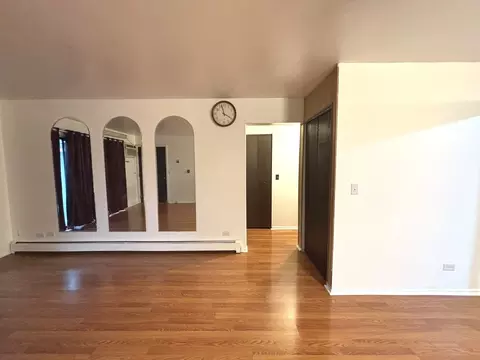 Living - 495 Mchenry Rd #1B, Wheeling, IL 60090 photo 1 of 2