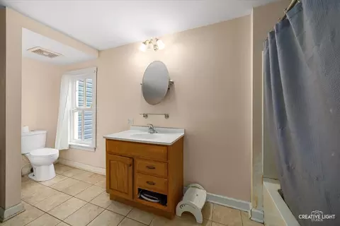 Bath - 107 E Comanche Ave, Shabbona, IL 60550 photo 1 of 2