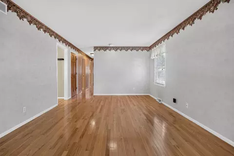 Living - 1204 Searle Dr, Normal, IL 61761 photo 2 of 4