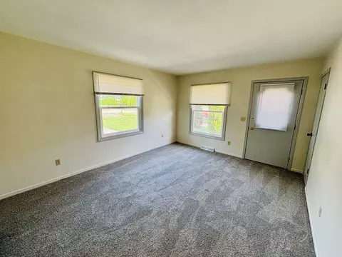 Living - 1009 1011 14th St, Silvis, IL 61282 photo 1 of 2