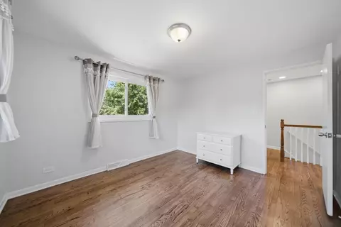 Bedroom - 1220 N Wheeling Rd, Mount Prospect, IL 60056 photo 5 of 6
