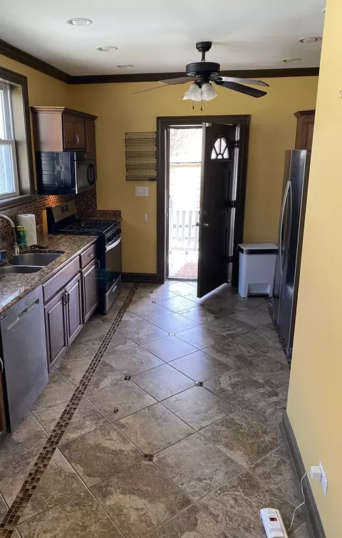 Kitchen - 1225 E 71st Pl, Chicago, IL 60619 photo 3 of 5