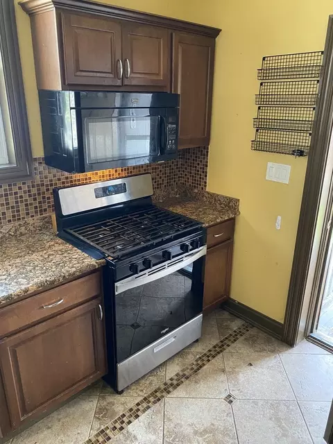 Kitchen - 1225 E 71st Pl, Chicago, IL 60619 photo 4 of 5