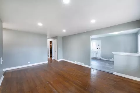Living - 1015 W Victoria Ave, Berkeley, IL 60163 photo 2 of 3