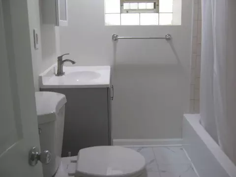 Bath - 1237 N Harding Ave, Chicago, IL 60651 photo 1 of 4