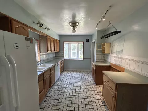 Kitchen - 165 W 34th St, Steger, IL 60475 photo 2 of 2