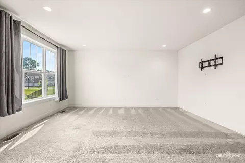 Living - 3553 Doral Dr, Elgin, IL 60124 photo 2 of 3