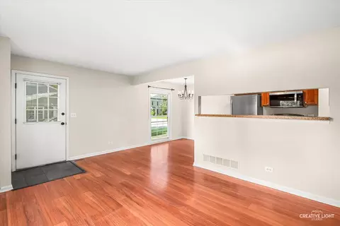 Living - 1681 Ashburn Ct #D, Wheaton, IL 60189 photo 4 of 4