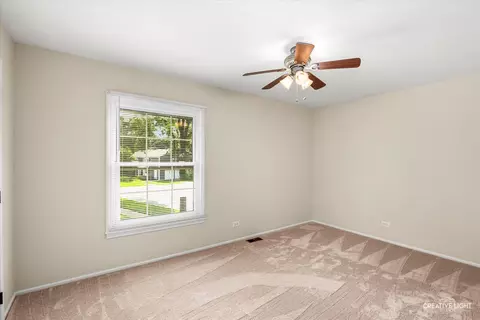 Bedroom - 1681 Ashburn Ct #D, Wheaton, IL 60189 photo 2 of 5