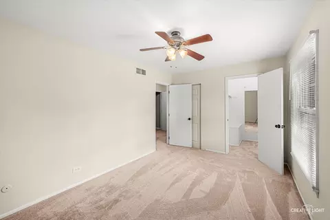 Bedroom - 1681 Ashburn Ct #D, Wheaton, IL 60189 photo 3 of 5