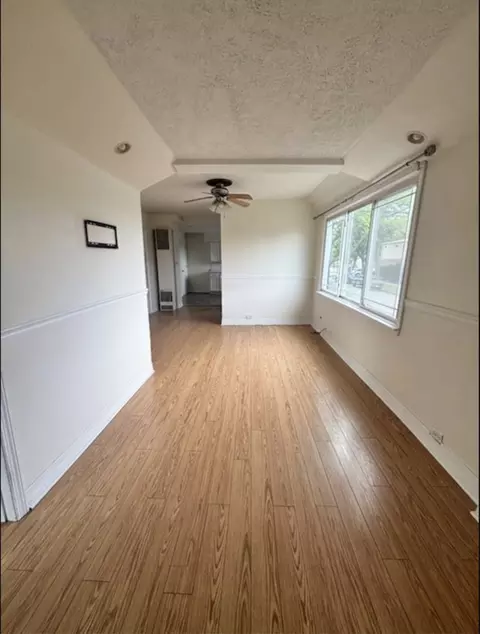Living - 5200 S Lorel Ave, Chicago, IL 60638 photo 3 of 3