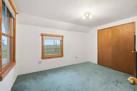 Bedroom - 402 S 1st St, Alpha, IL 61413 photo 3 of 5