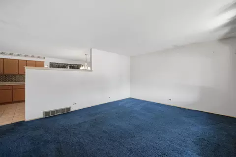 Living - 730 W Beach Dr, Addison, IL 60101 photo 1 of 2