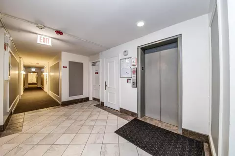 Entry Way - 5300 Carriage Way Dr #107, Rolling Meadows, IL 60008 photo 2 of 2