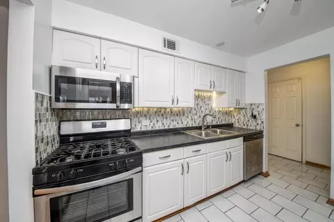 Kitchen - 5300 Carriage Way Dr #107, Rolling Meadows, IL 60008 photo 1 of 3