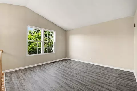 Living - 1033 Symphony Dr, Aurora, IL 60504 photo 2 of 7