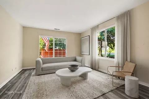 Living - 1033 Symphony Dr, Aurora, IL 60504 photo 6 of 7