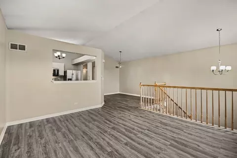 Living - 1033 Symphony Dr, Aurora, IL 60504 photo 1 of 7