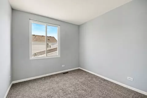 Bedroom - 1033 Symphony Dr, Aurora, IL 60504 photo 2 of 4