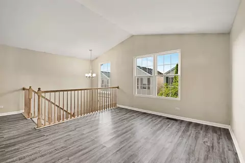 Living - 1033 Symphony Dr, Aurora, IL 60504 photo 3 of 7