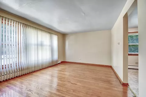 Living - 272 E 148th St, Harvey, IL 60426 photo 2 of 2