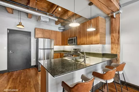 Kitchen - 106 N Aberdeen St #4F, Chicago, IL 60607 photo 1 of 2