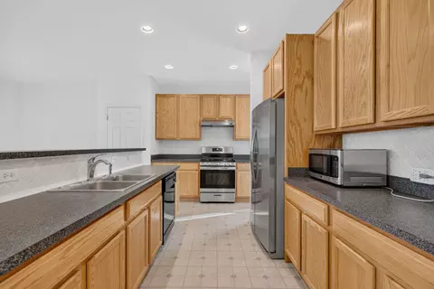 Kitchen - 3020 Chalkstone Ave, Elgin, IL 60124 photo 6 of 6
