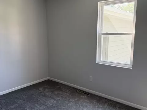 Bedroom - 402 E 2nd St, Gilman, IL 60938 photo 2 of 2
