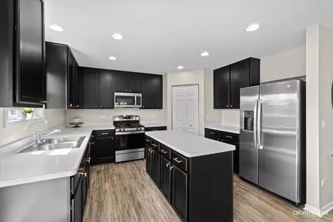 Kitchen - 305 Cooper St, Plano, IL 60545 photo 1 of 2