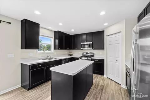 Kitchen - 305 Cooper St, Plano, IL 60545 photo 2 of 2