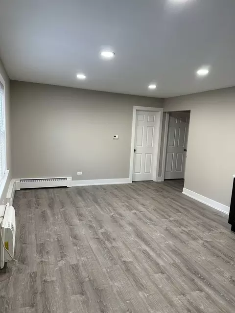 Living - 7645 S Roberts Rd, Bridgeview, IL 60455 photo 4 of 4
