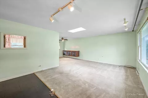 Living - 933 Carol Ave, Elgin, IL 60123 photo 1 of 4