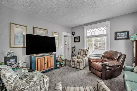 Living - 1435 10th St, Moline, IL 61265 photo 1 of 2