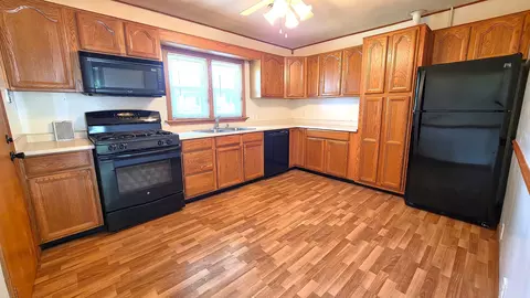 Kitchen - 208 E 8th Ave, Colona, IL 61241 photo 1 of 3