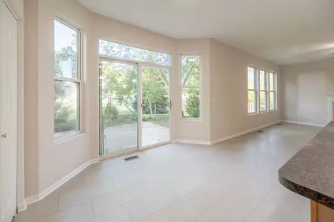 Living - 1401 Bridgehampton Dr, Plainfield, IL 60586 photo 2 of 3