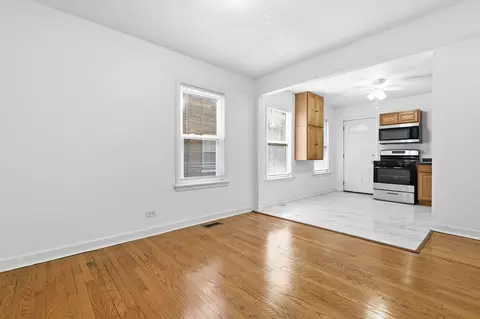 Living - 233 E 143rd St, Dolton, IL 60419 photo 3 of 3