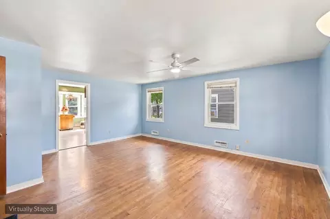 Living - 121 S Commonwealth Ave, Elgin, IL 60123 photo 2 of 6