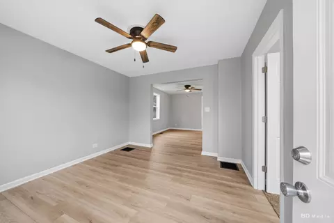 Living - 3300 Butler Ave, Steger, IL 60475 photo 1 of 2
