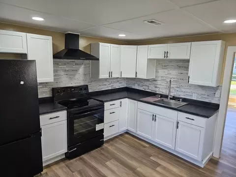 Kitchen - 401 NE 3rd St, Aledo, IL 61231 photo 2 of 2