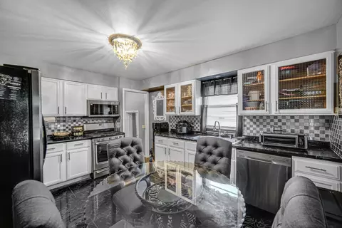 Kitchen - 351 E 146th St, Harvey, IL 60426 photo 2 of 3